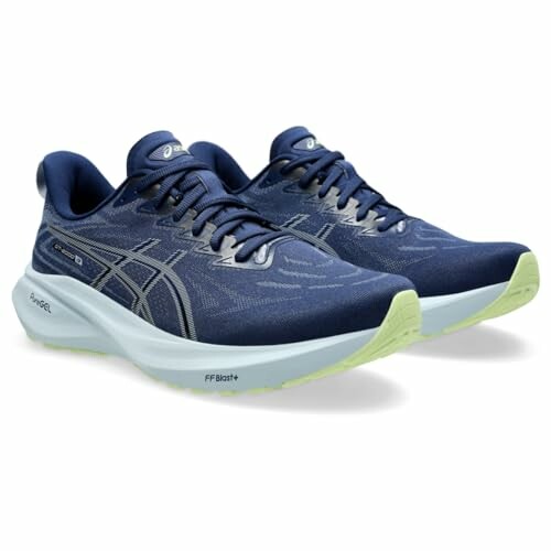 Blue Asics running shoes with light green soles