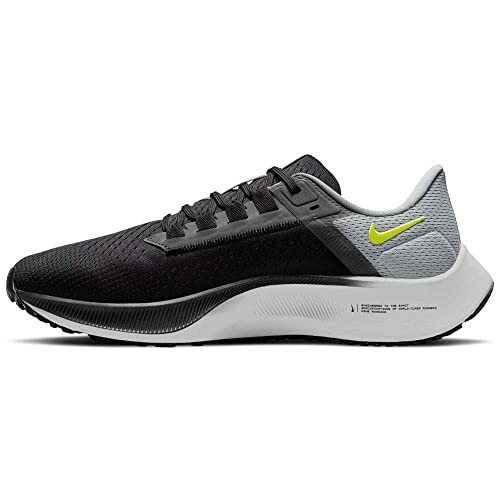 Black and gray running shoe with a white sole and lime green logo