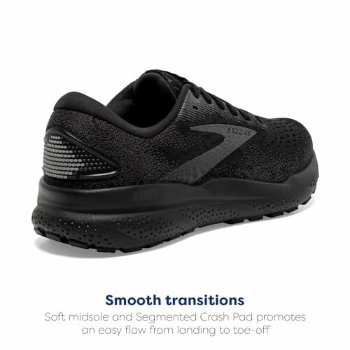 Black running shoe with smooth transitions feature.