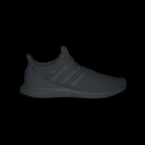 Dark silhouette of a running shoe on a black background