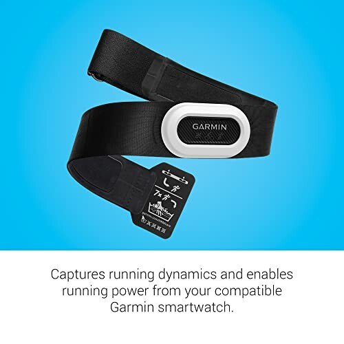 Garmin heart rate monitor with strap on blue background
