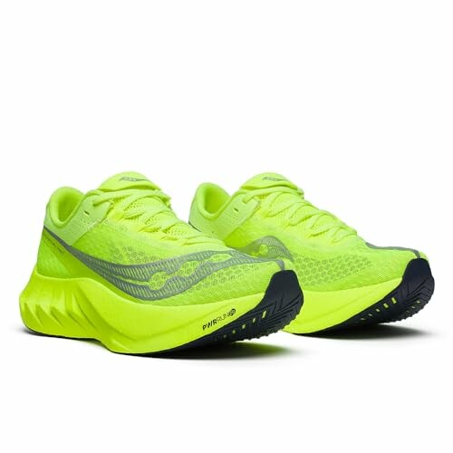 Neon green running shoes with black soles