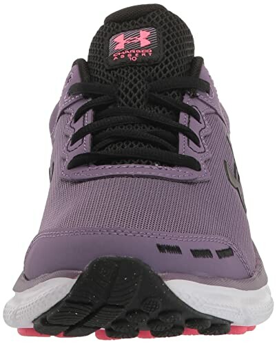 Front view of a purple running shoe with black and pink accents.