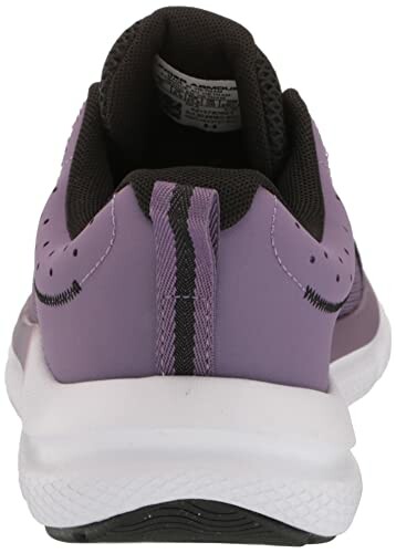 Back view of a purple sneaker with white sole.