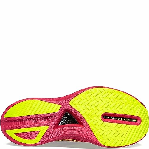 Brightly colored running shoe sole with traction pattern