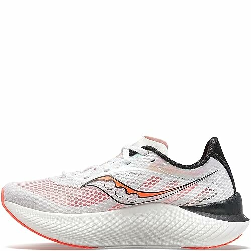 White and orange Saucony running shoe