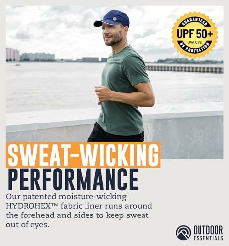 Man wearing a cap and t-shirt by waterfront, highlighting sweat-wicking performance.